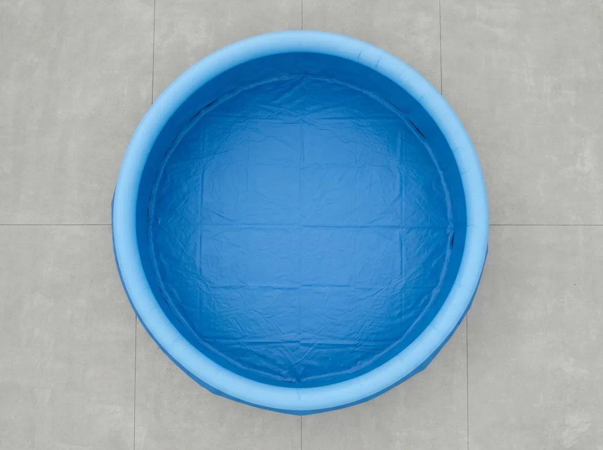 A clear, overhead view of the Summer Waves pool showing its round shape and blue interior.